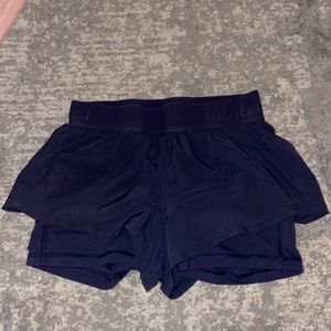 Navy blue size 6 lululemon shorts with built in shorts